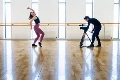 Dancer being filmed in a dance studio