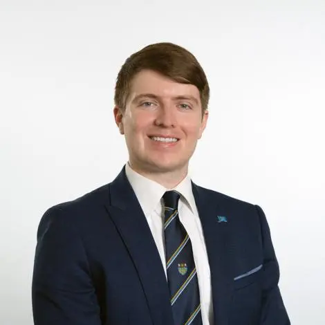 Cllr Alistair Jeffreys wearing suit and tie