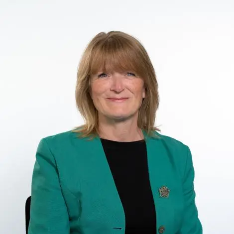 Cllr Annette Dunning wearing green jacket and black top