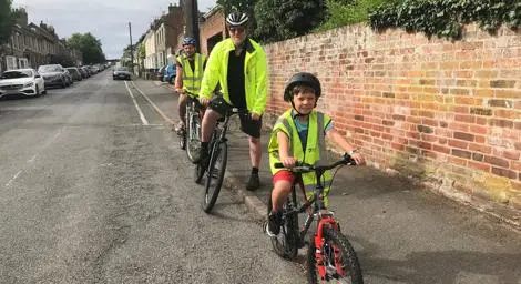Cyclists along quiet road