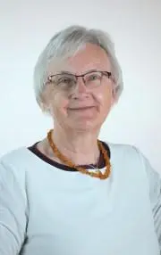 Image of Inga Lockington wearing light coloured top and necklace