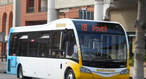A bus is parked and waiting for passengers to board