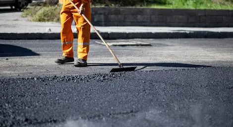 Man repairing road