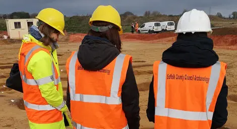 SCCAS Staff looking at an open trench