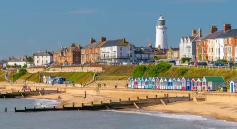 Southwold beach on a sunny day with the lighthouse overlooking the beach