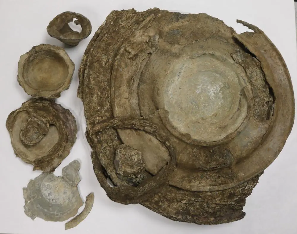 The Euston hoard showing late Roman pewter plates, platters, bowls and a cup.